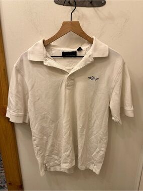 Greg Norman Collection White Polo with Shark Emblem